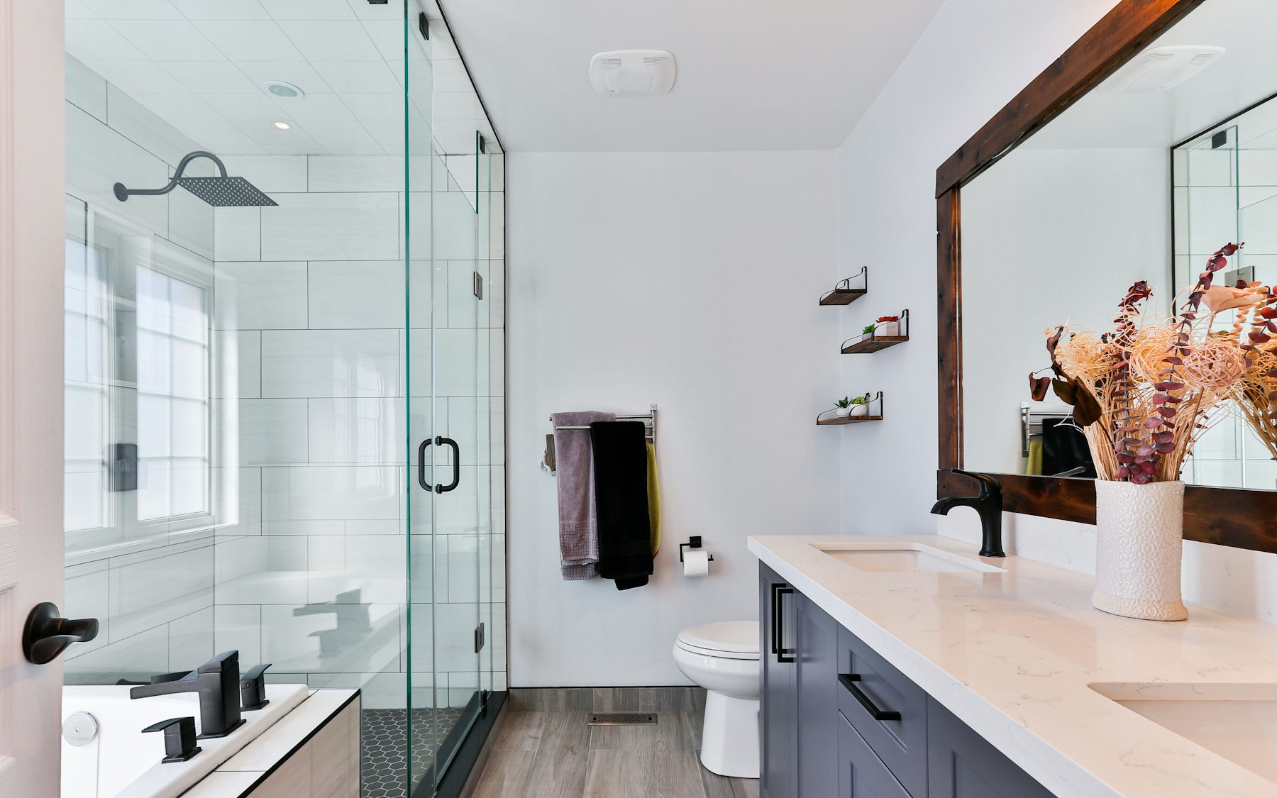 Contemporary finished bathroom installation with clean fixtures and neutral tiling.